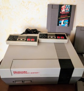 lot 53 image: Nintendo Game Console and Games