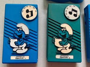 Four Vintage Smurf Battery Operated Radios