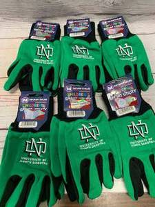 lot 25 image: Six Pair of UND Kids Gloves