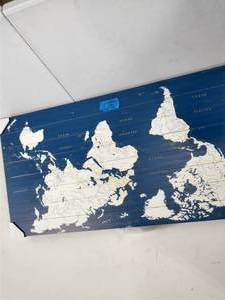 lot 30 image: World Map Dark Blue Planked Wood Map Travel Art Print 25 in. x 50 in.