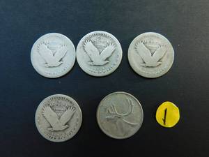 Five Silver Quarters 4 Standing Liberty Quarters and 1 1962 Canadian Quarter