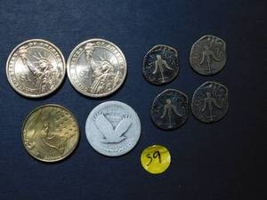 Two BU Presidential Dollars (Lincoln and Polk), One Standing Liberty Quarter, Four Widows mite replica coins, and One Good Luck Token