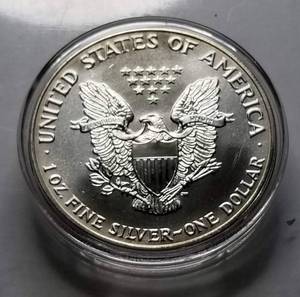 1991 AMERICAN SILVER EAGLE 1 TROY OZ. .999 FINE SILVER IN AIRITITE