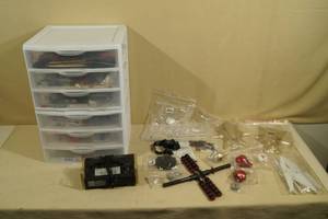 lot 137 image: Plastic Organizer with Drone Parts and Small Aircraft