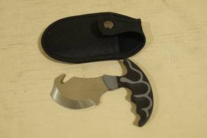 lot 103 image: Gerber Knife with Gut Hook and Sheath