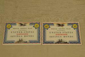 lot 37 image: 2 United States Defense Savings Bonds Folders with Stamps