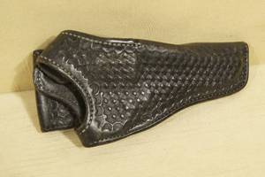 lot 31 image: Northern Plains Leather Handgun Holster with Basket Weave Finish
