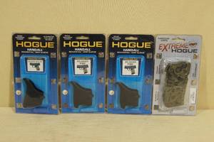 lot 24 image: 4 Hogue Handgun Grips - Sig, Glock, Extreme Series