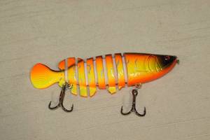 lot 52 image: Unused Large Jointed Fishing Lure - Over 4 Long