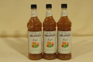lot 141 image: Le Sirup de Monin Peach Flavoring