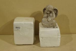 lot 95 image: Believe Cherub Lawn Ornaments