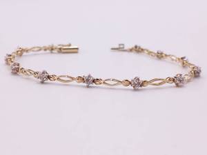 12 Carat Diamond and Yellow Gold Oval Link Tennis Bracelet