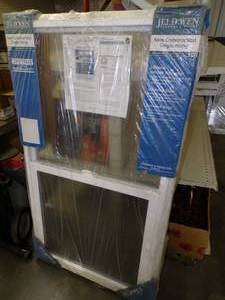 Pair of Vinyl Single Hung Window still in package  30 x 54