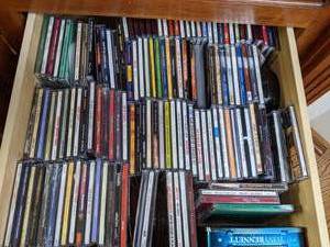 lot 189 image: Large Mixed Lot of CDs, DVDs, & VHS Out to Sea, Pretty Womans, Forest Gump, Tony Bennett, Frank Sinatra & More