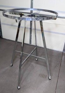 lot 242 image: Round Metal Clothing Rack on Wheels