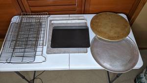 lot 78 image: Pizza Stone, Pizza Pan, and Baking Sheets & Racks