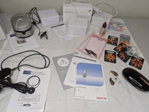 lot 120 image: Trax 42 XM Hearing Aids by Rexton w Accessories