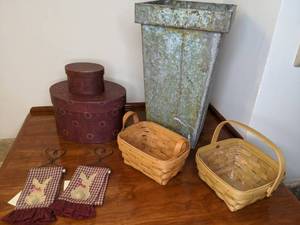 lot 123 image: (2) Vintage handmade woven baskets, (2) Round Hat Boxes, Set of 2 Kitchen Towels, Tall Metal Planter