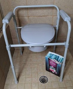 lot 127 image: Drive Medical Steel Folding Bedside Commode