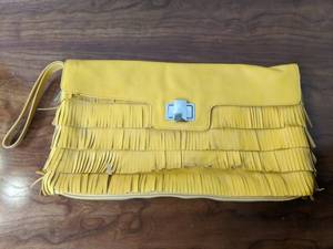lot 138 image: Frilly Kate Spade Yellow Clutch