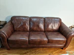 lot 11 image: Beautiful Brown Full Size Faux Leather Couch