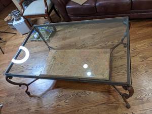 lot 8 image: Elegant Glass Top Coffee Table with Metal Base and Marble Finish Shelf