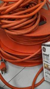 lot 260 image: Lot of Heavy Duty Orange Extension Cords on Reels, Mylar Insulation, Etc.