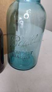 lot 261 image: Case of Amber Beverage Bottles & One Blue Glass Ball Jar