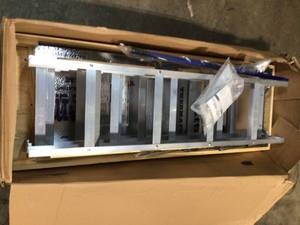 lot 36 image: Everest 10 ft. - 12 ft., 22.5 in. x 63 in. Aluminum Attic Ladder with 350 lb. Load Capacity not used see pictures customer return