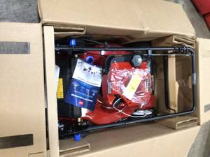 lot 39 image: Toro Recycler 22 in. SmartStow High Wheel Variable Speed Walk Behind Gas Self Propelled Mower not used see pictures