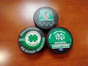 3 Fighting Sioux Championship Pucks