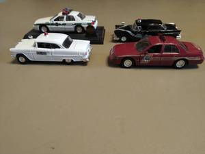 lot 270 image: Four Law Enforcement Model Cars