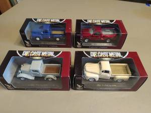 lot 273 image: Four Ford Model Trucks