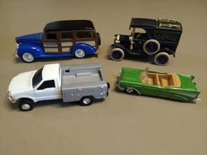 lot 280 image: Four Ertl Model Cars
