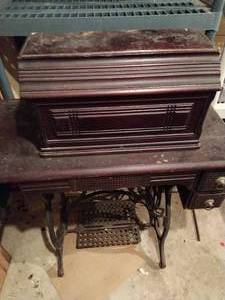 lot 23 image: Favorite Sewing Machine And Cabinet