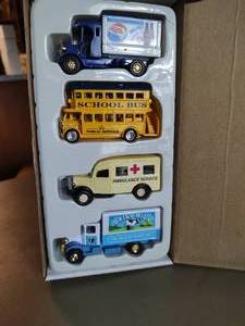 lot 256 image: Set of Four Golden Wheel Die Cast Cars