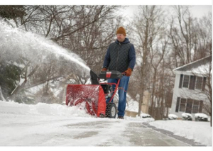lot 48 image: 24 in. 208 cc Two-Stage Gas Snow Blower with Electric Start Self Propelled The retail price $699.99