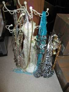 Two jewelry Tree stands filled with...
