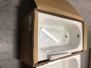 lot 8 image: Lot of 2 Right Hand Drain Rectangular Apron Front Bathtub in White (both have damage) see pictures