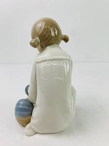Lladro Nao Figurine -  titled Young Girl Holding Baby Doll