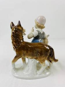 Porcelain Figurine - Girl with WolfDog