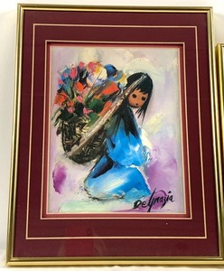 A Framed Eugenia Louis Print And A De Grazia Calendar Print