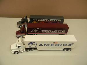 CORVETTE - 1 ERTL 164 SCALE DIE-CAST WHITE GMC CAB WITH DROP-BED TRAILER #T143 & 2 ERTL 164 SCALE DIE-CAST WHITE GMC AERO CONVENTIONAL WITH TRAILER #2074 - NEW IN BOX - SEE PICTURES