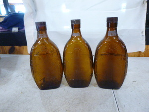 3 Brown Bottles Federal Law Forbids Sale or Reuse of This Bottle