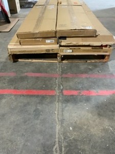lot 23 image: Pallet of Closet Evolution Drawer Kits & Closet System. Various Conditions. See Pictures