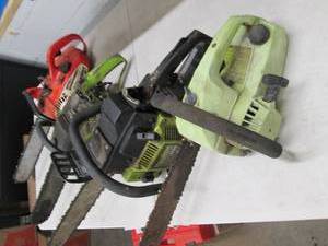 4 chainsaws with boxes of parts all...