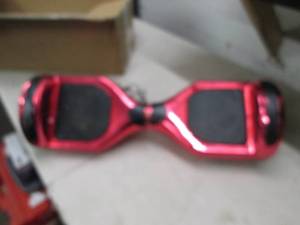 red hoverboard with bluetooth and p...