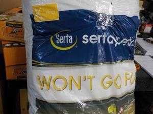 lot 226 image: Serta king size Wont Go Flat Pillow...