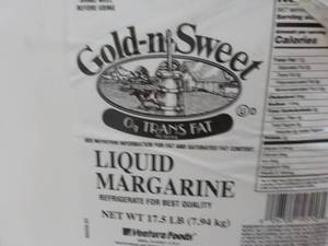 lot 412 image: 2 - 17.5 lb. Jugs Gold-n-Sweet Liqu...