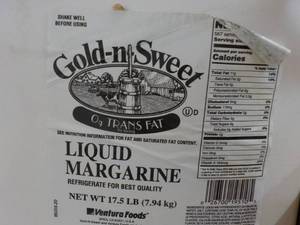 lot 413 image: 2 - 17.5 lb. Jugs Gold-n-Sweet Liqu...